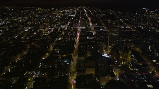 AXSF07_018 - 5K aerial stock footage following California Street past Huntington Hotel, Grace Cathedral, in Nob Hill, San Francisco, California, night