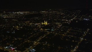 AXSF07_049 - 5K aerial stock footage tilt to reveal St. Ignatius Church, Inner Richmond District, San Francisco, California, night
