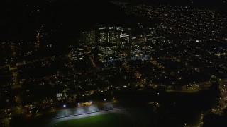 AXSF07_051 - 5K aerial stock footage Kezar Stadium and UCSF Medical Center, Inner Sunset District, San Francisco, California, night