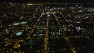 AXSF07_055 - 5K aerial stock footage tilt from Fulton Street to reveal San Francisco City Hall, Civic Center, San Francisco, California, night