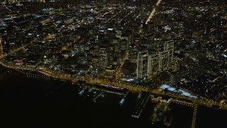 AXSF07_079 - 5K aerial stock footage high altitude view of Ferry Building, Downtown San Francisco, California, night