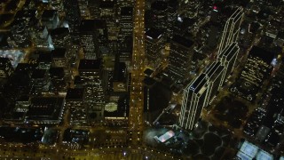 AXSF07_080 - 5K aerial stock footage of a bird's eye of Ferry Building, Embarcadero, Market St, Downtown San Francisco, night