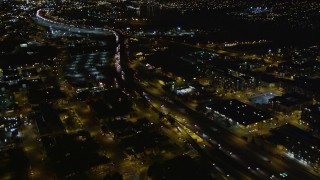 AXSF07_094 - 5K aerial stock footage of light traffic on I-880 freeway, Oakland, California, night