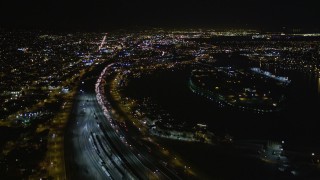 AXSF07_095 - 5K aerial stock footage video of following I-880 freeway, Oakland, California, night