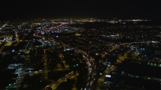 AXSF07_096 - 5K aerial stock footage approach and follow Interstate 880, Oakland, California, night