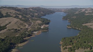 AXSF08_013 - 5K aerial stock footage across hills, reveal San Pablo Reservoir, Orinda, California