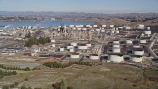 AXSF08_015 - 5K aerial stock footage of flying by the ConocoPhillips Oil Refinery, Rodeo, California