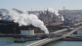 AXSF08_020 - 5K aerial stock footage of flying by the ConocoPhillips Oil Refinery, Rodeo, California