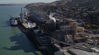 AXSF08_030 - 5K aerial stock footage approach and fly past the C&H Pure Cane Sugar Factory, Crockett, California