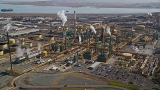 AXSF08_033 - 5K aerial stock footage of approaching and flying by the Valero Oil Refinery, Benicia, California