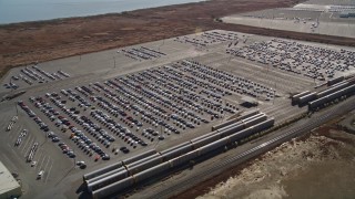 AXSF08_036 - 5K aerial stock footage of cars at the Valero Oil Refinery parking lot, Benicia, California