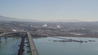 AXSF08_046 - 5K aerial stock footage pan from the Benicia-Martinez Bridge to the Shell Oil Refinery, California