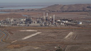 AXSF08_052 - 5K aerial stock footage of flying by the Tesoro Golden Eagle Refinery, Pacheco, California