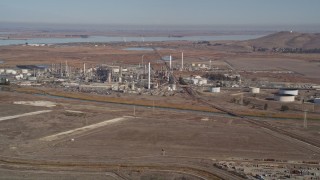 AXSF08_053 - 5K aerial stock footage of flying by the Tesoro Golden Eagle Refinery, Pacheco, California