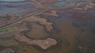 AXSF08_063 - 5K aerial stock footage video of a reverse view of the Belloma Slough, Bay Point, California