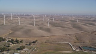AXSF08_064 - 5K aerial stock footage of approaching windmills at Shiloh Wind Power Plant, Montezuma Hills, California
