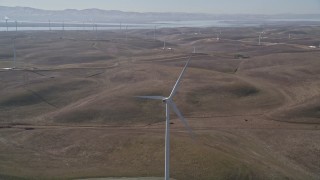 AXSF08_068 - 5K aerial stock footage approach and flyby a windmill at Shiloh Wind Power Plant, Montezuma Hills, California