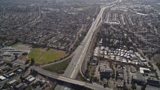 AXSF08_094 - 5K aerial stock footage of flying by freeway and suburban neighborhoods, Concord, California