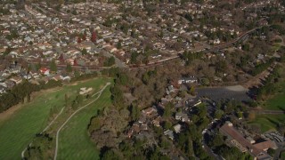 AXSF09_002 - 5K aerial stock footage fly away from suburban houses, Contra Costa Golf Club, Pleasant Hill, California