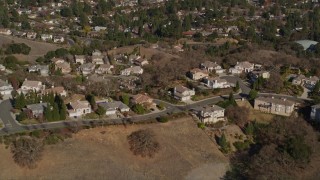 AXSF09_006 - 5K aerial stock footage of flying away from suburban tract homes and hills, Lafayette, California