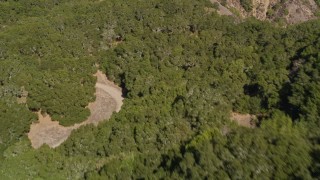 AXSF09_008 - 5K aerial stock footage of a reverse view of wooded hills, Briones Regional Park, Martinez, California