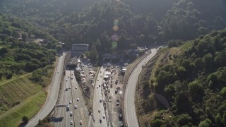 AXSF09_011 - 5K aerial stock footage of light traffic on Highway 24 freeway entering the Caldecott Tunnel, Orinda, California