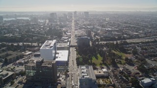 AXSF09_016 - 5K aerial stock footage of following Broadway toward Interstate 580 freeway, Oakland, California