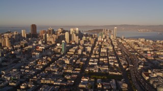 AXSF10_020 - 5K aerial stock footage of downtown skyscrapers, and I-80 in South of Market, San Francisco, California, sunset