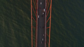AXSF10_039 - 5K aerial stock footage bird's eye view of traffic on the Golden Gate Bridge, San Francisco, California, sunset
