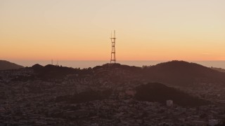 AXSF10_071 - 5K aerial stock footage of a view of Sutro Tower from Downtown San Francisco, California, sunset