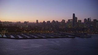 AXSF10_101 - 5K aerial stock footage Financial District skyline and South Beach Harbor, South of Market, San Francisco, California, twilight