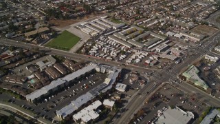 AXSF11_002 - 5K aerial stock footage of flying away from suburban tract homes, San Leandro, California