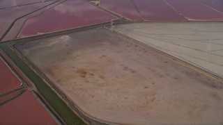 AXSF11_014 - 5K aerial stock footage of a reverse view salt marshes, Newark, California
