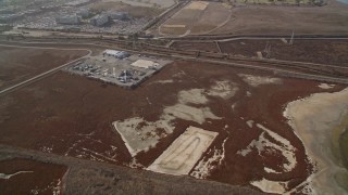 AXSF11_031 - 5K aerial stock footage fly over marshland to reveal Google office buildings, Mountain View, California