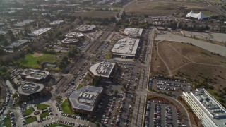 AXSF11_032 - 5K aerial stock footage of flying over office buildings and baseball field, Mountain View, California