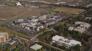 AXSF11_035 - 5K aerial stock footage of orbiting Googleplex office buildings in Mountain View, California