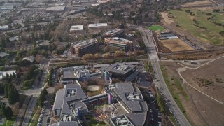 AXSF11_044 - 5K aerial stock footage tilt up to reveal Googleplex, tilt down on three office buildings, Mountain View, California