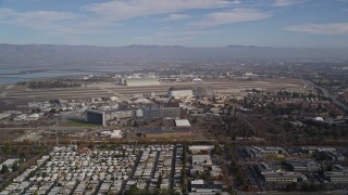 AXSF11_049 - 5K aerial stock footage flyby Moffett Field and the NASA Ames Research Center, Mountain View, California