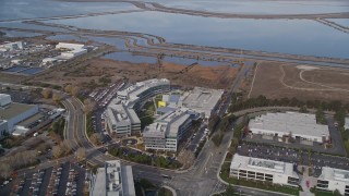 AXSF11_056 - 5K aerial stock footage of flying by the Yahoo! Campus office buildings, Sunnyvale, California