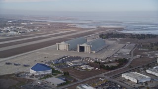 AXSF11_060 - 5K aerial stock footage of Hangars 2 and 3 at Moffett Field, Mountain View, California