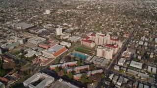 AXSF12_004 - 5K aerial stock footage of orbiting San Jose State University, Downtown San Jose, California
