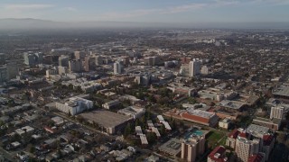 AXSF12_005 - 5K aerial stock footage of flying by San Jose State University and Downtown San Jose, California