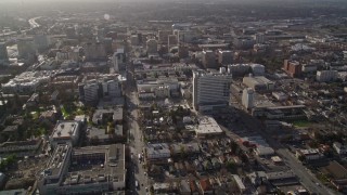 AXSF12_007 - 5K aerial stock footage of following East San Fernando Street, approaching city hall, Downtown San Jose, California