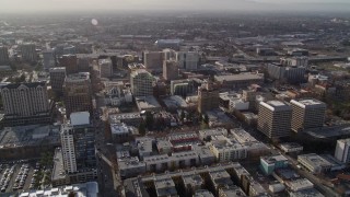 AXSF12_008 - 5K aerial stock footage tilt from West San Fernando Street, revealing Downtown San Jose office buildings, California