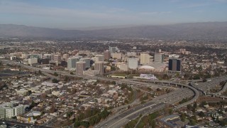 AXSF12_010 - 5K aerial stock footage of the city seen from Highway 87/Interstate 280 freeway interchange, Downtown San Jose, California