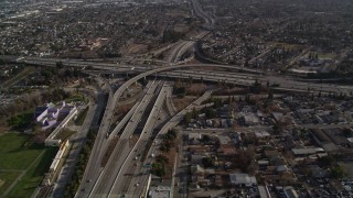AXSF12_016 - 5K aerial stock footage approach freeway, reveal busy interchange near Downtown San Jose, California