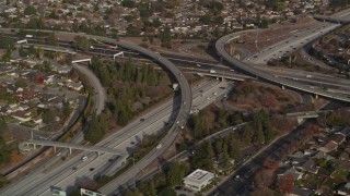 AXSF12_019 - 5K aerial stock footage of flying by Highway 87/Interstate 280 freeway interchange, Downtown San Jose, California