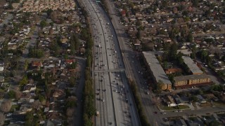 AXSF12_021 - 5K aerial stock footage reverse view of light traffic on Interstate 280, San Jose, California