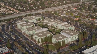 AXSF12_026 - 5K aerial stock footage of tilting to reveal Apple Headquarters office buildings, Cupertino, California
