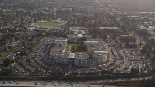 AXSF12_028 - 5K aerial stock footage of Apple Headquarters office buildings, Cupertino, California